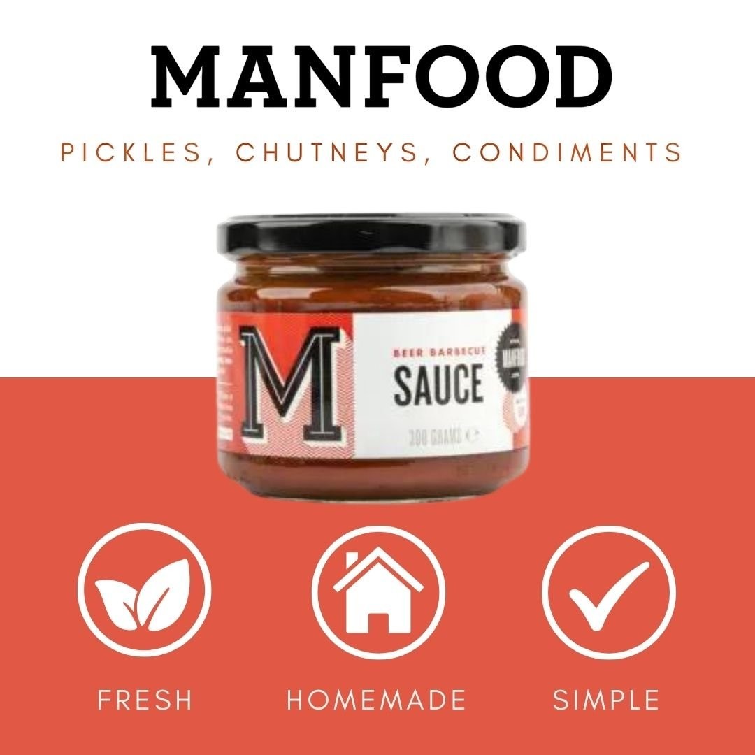 Manfood Beer Barbecue Sauce in a glass jar with red label, featuring bold text and artisanal branding.