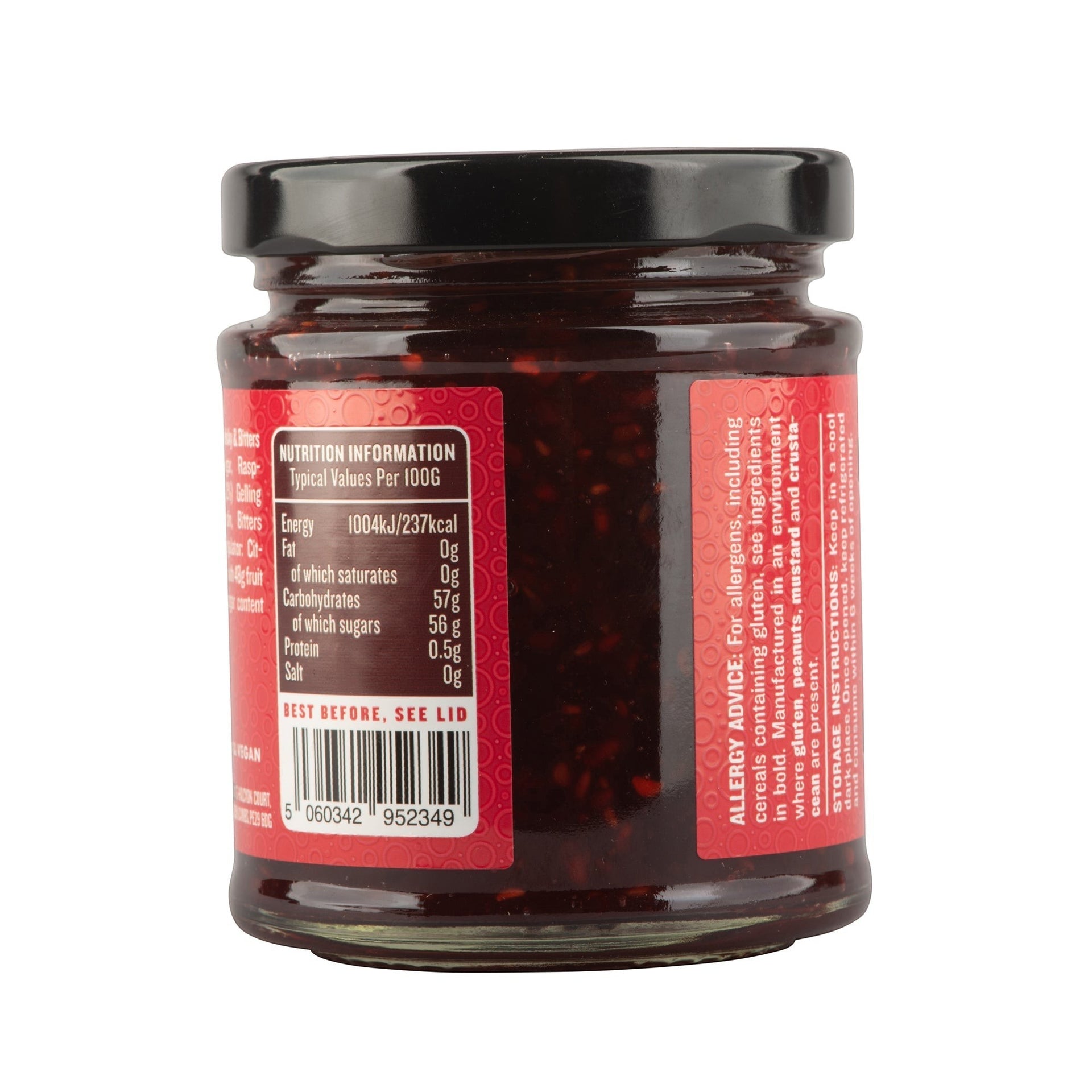 Manfood Cambs Raspberry Old Fashioned Jam jar showing nutrition information label on a red background