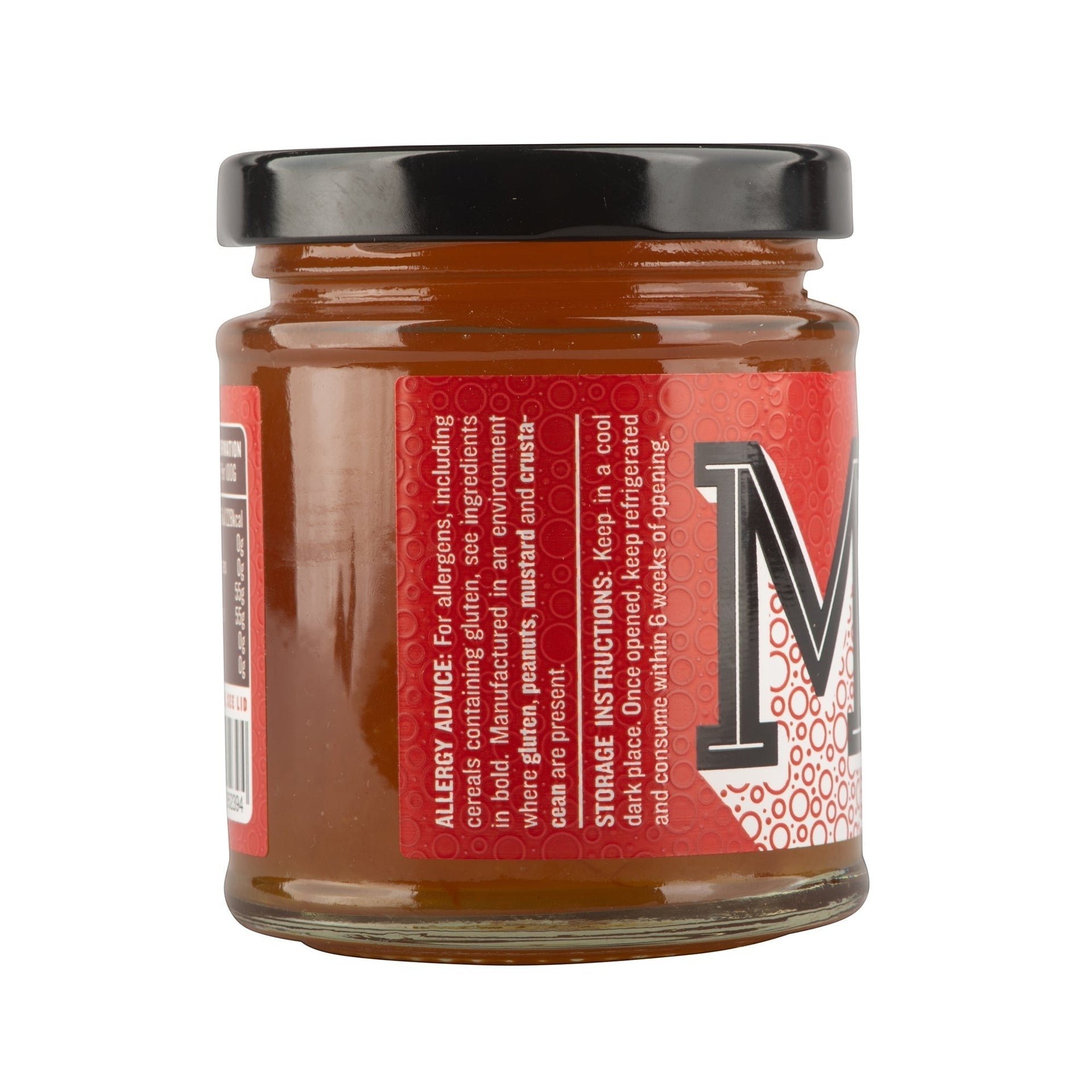Manfood Cambs Whisky Marmalade in a 227g glass jar with a black lid, featuring a red label with product details.