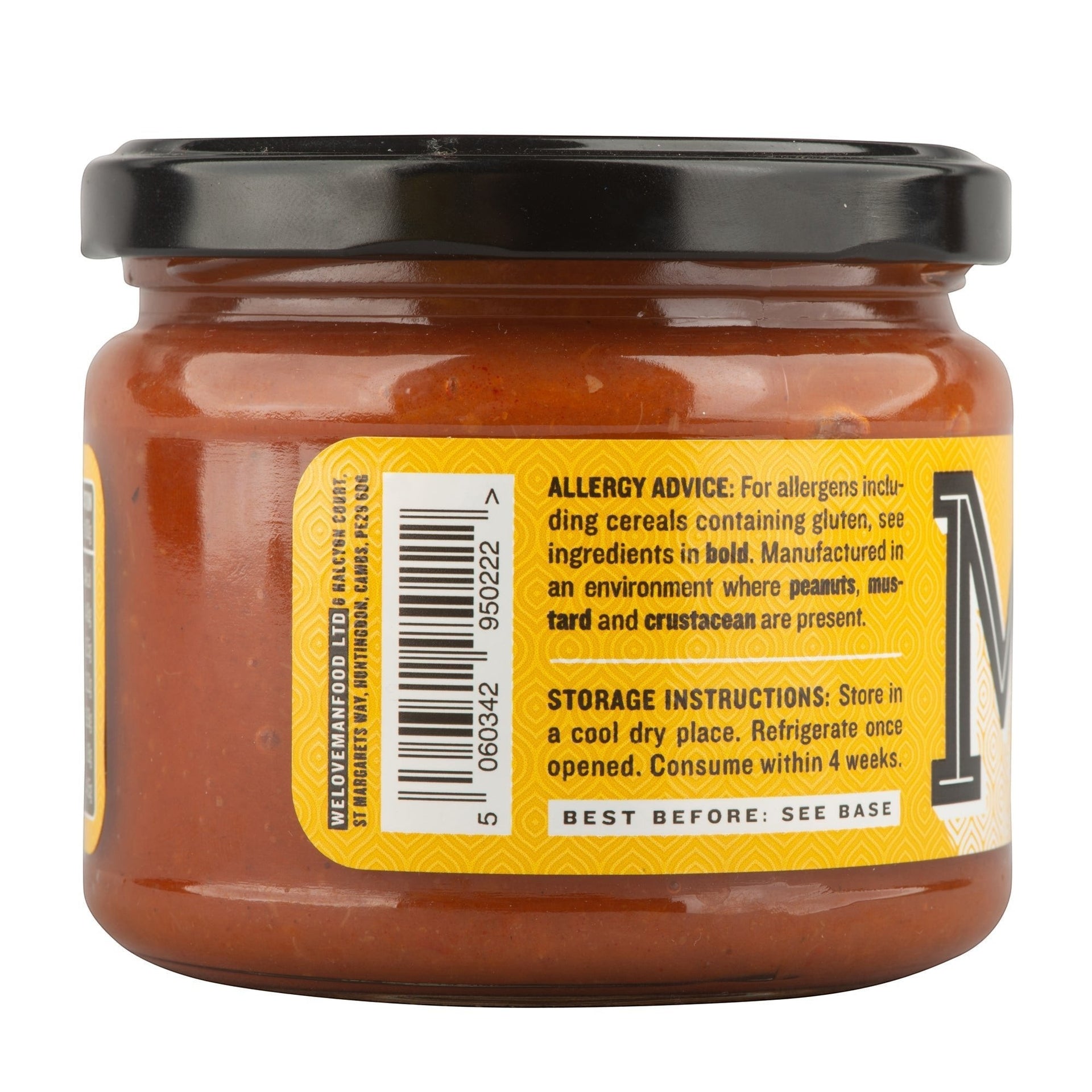 Manfood hot chilli sauce in a glass jar with a yellow label showing ingredients and storage information