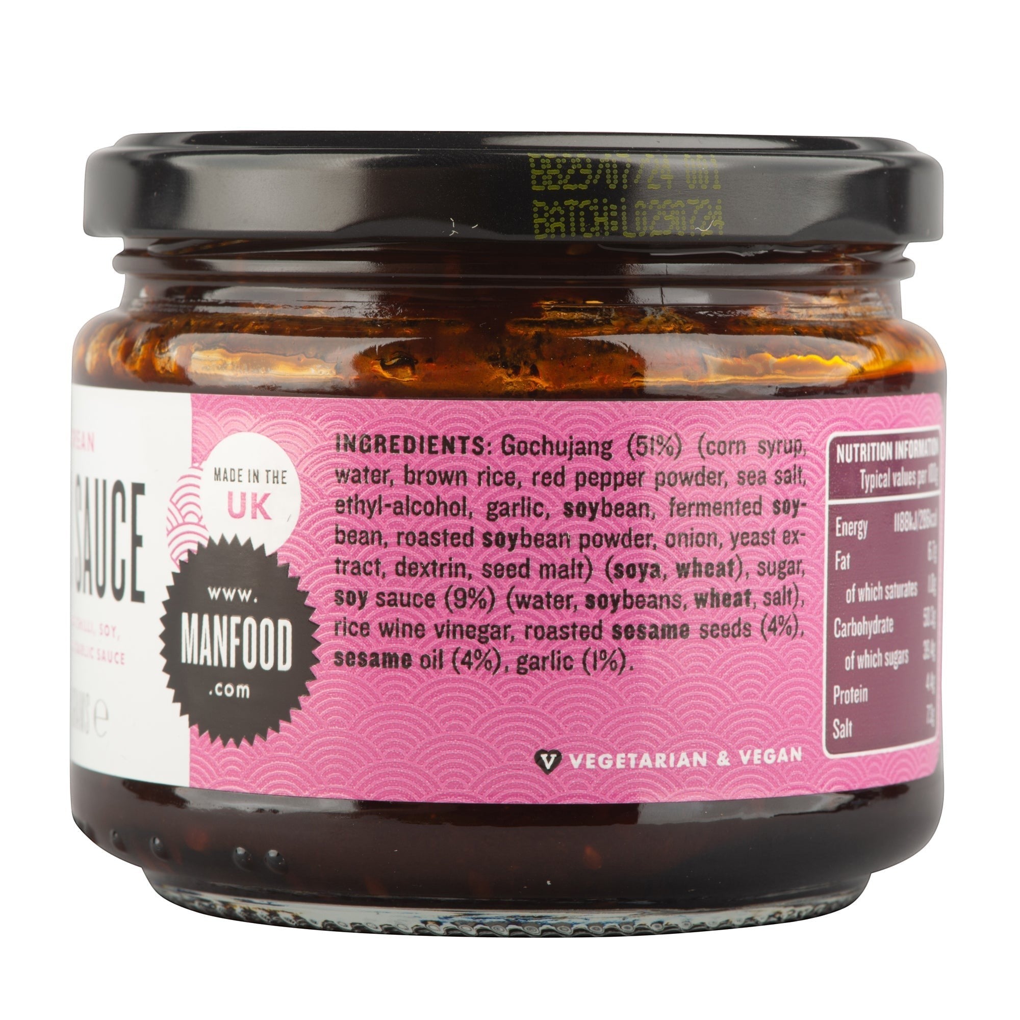 Manfood Korean Taco Sauce jar showing ingredients list and nutritional information on a pink label