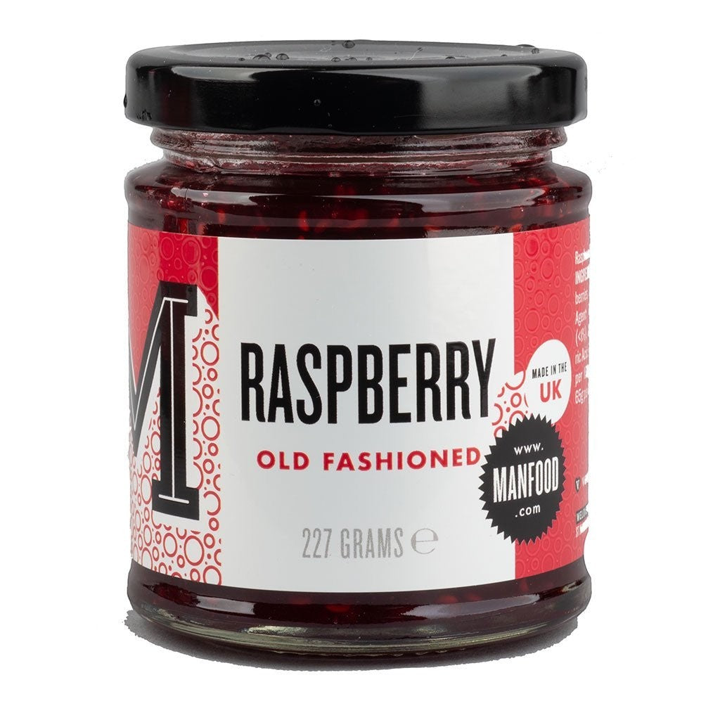 Manfood Raspberry Old Fashioned Jam in a glass jar with a black lid, featuring a red and white label.