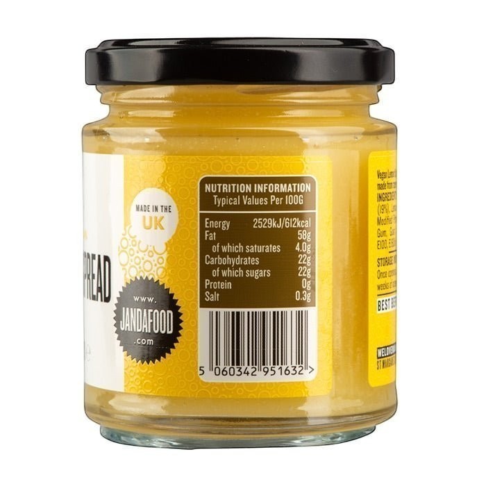 Manfood vegan lemon curd in a glass jar showing nutritional information label and barcode