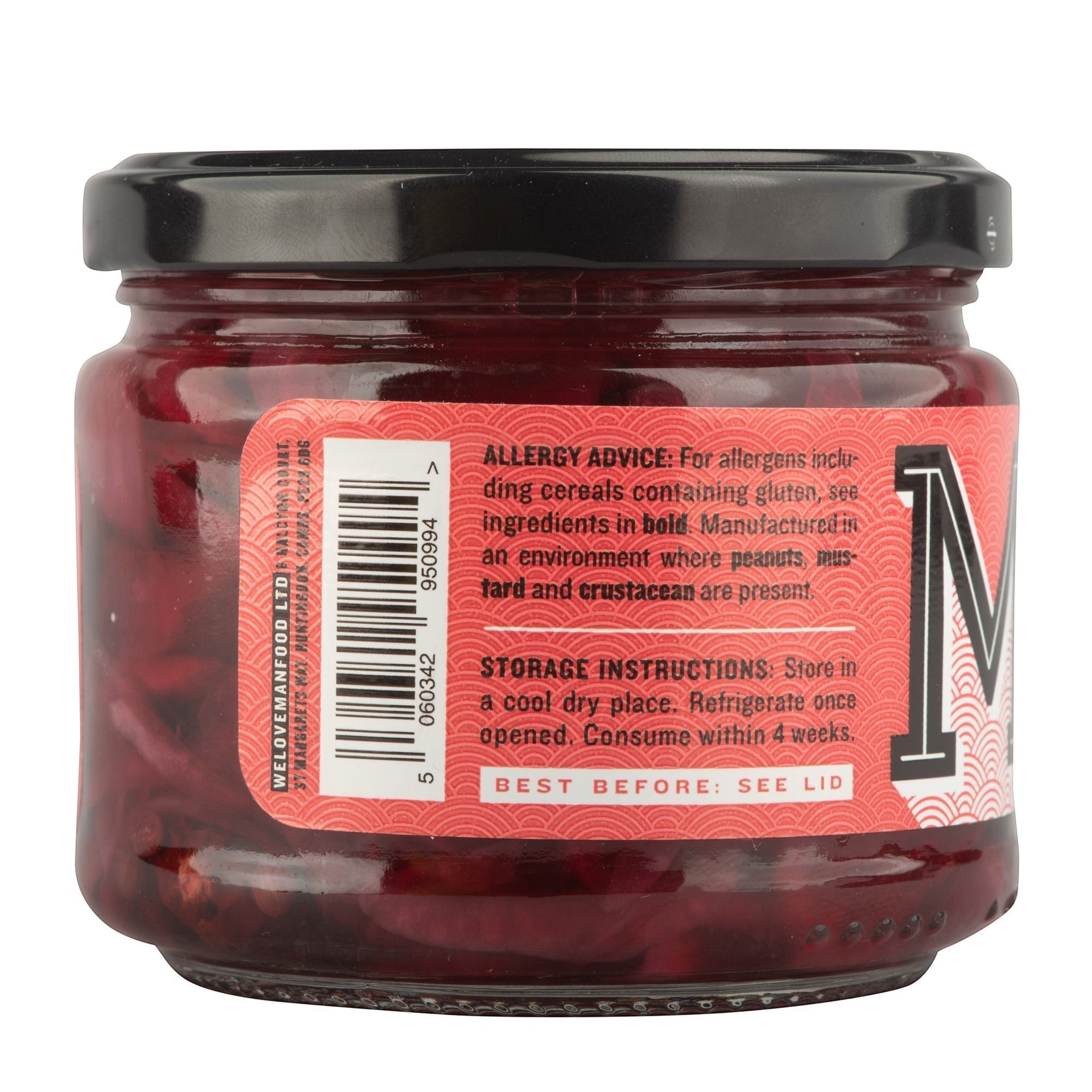 Manfood jar of sliced red onions pickled in spiced red wine vinegar with star anise and Sichuan peppercorns